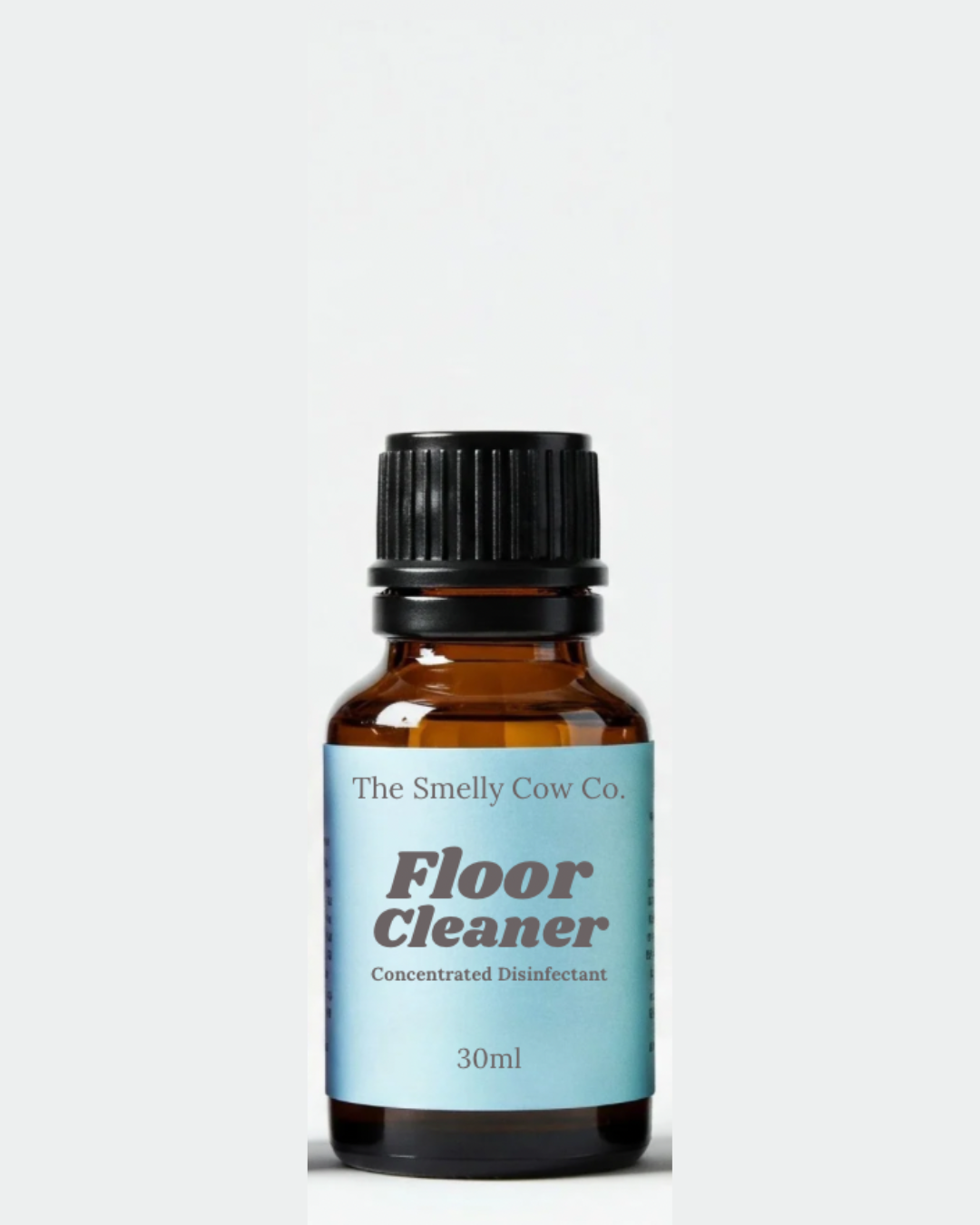 A 30ml amber glass bottle with floor cleaner concentrate inside.